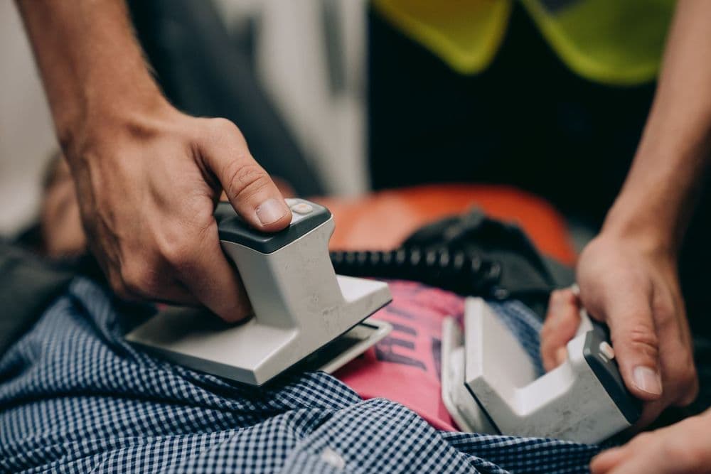A defibrillator being used during an emergency response